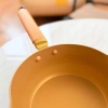 18cm-20cm Golden tourmaline snow flat pot milk pot, daily necessities rice cooker tourmaline snow flat pot milk pot details Picture